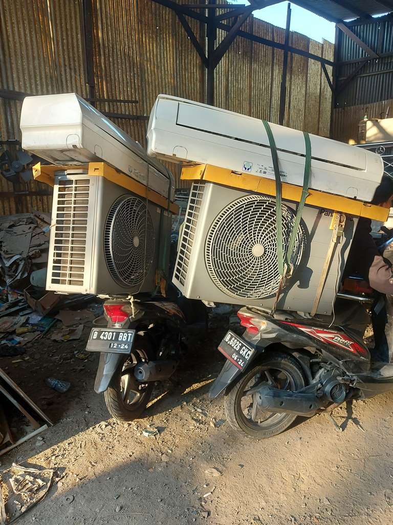 Transaksi pembelian AC bekas kantor